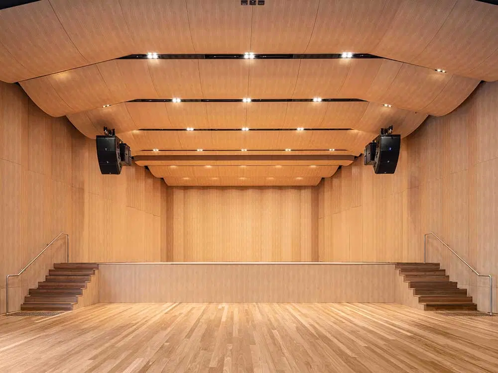 Modern concert hall stage with wooden flooring