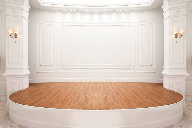 Elegant circular stage with light wood flooring