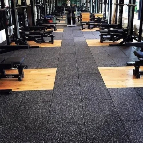 Gym flooring with interlocking rubber tiles
